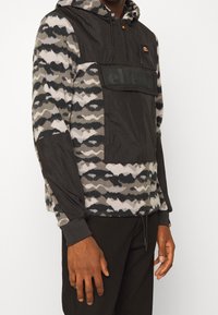 Ellesse Vindjacka - black