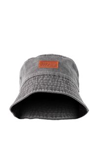 Gray cotton bucket hat with a textured surface, wide brim, and a rectangular brown leather patch on the front.