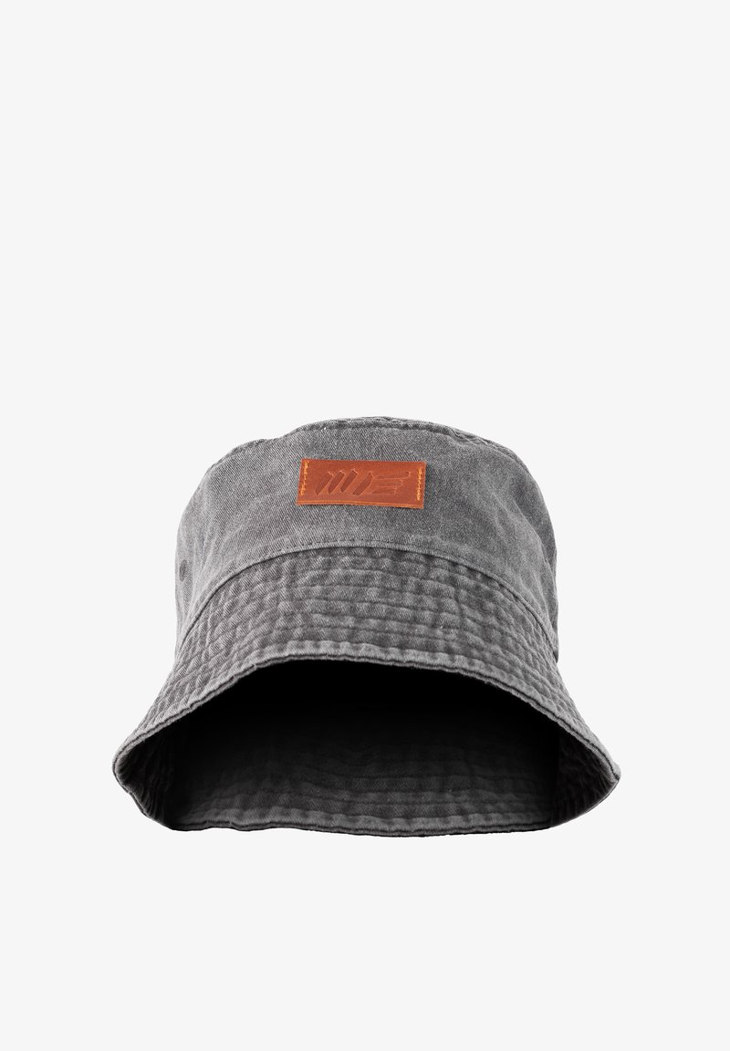 Gray cotton bucket hat with a textured surface, wide brim, and a rectangular brown leather patch on the front.