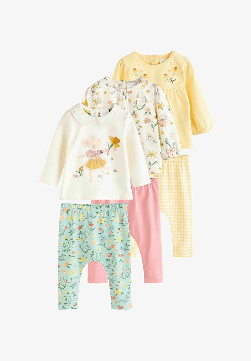 Four-piece baby clothing set: white top with embroidered bear, floral print top, yellow top, and floral patterned pants in pastel colors.