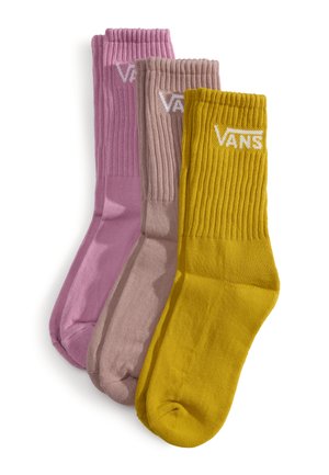 Set of three ribbed socks in pink, mauve, and yellow. Each sock features a logo with a crew length and a soft, stretchy fabric.