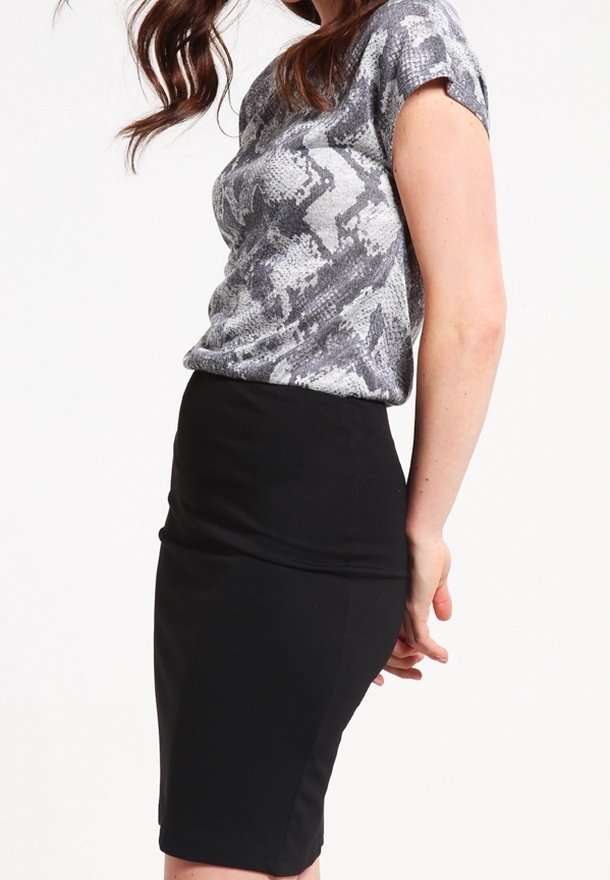 Gray patterned short-sleeve top paired with a fitted black pencil skirt, showcasing a structured silhouette and smooth textures.
