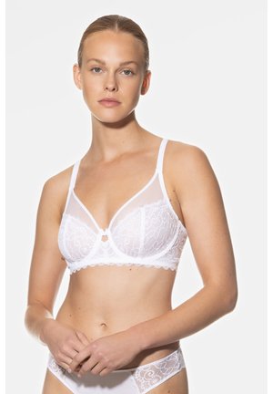 Witte kanten bh met semi-transparant gaas, beugelondersteuning, golvende rand en een centrale sleufdetail. Eenvoudige verstelbare bandjes.