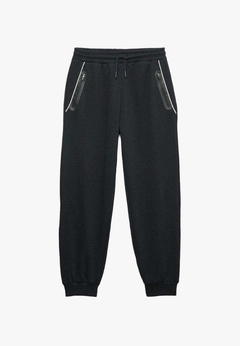 Schwarze Jogginghose aus weichem Stoff, mit einer Kordelzug-Daumen und zwei seitlichen Reißverschlusstaschen mit eleganten schwarzen Akzenten.