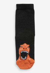 Schwarze Socken mit einem großen, orangefarbenen Dinosaurierkopf-Graphic, der einen weit geöffneten Mund mit Zähnen und detaillierten Gesichtszügen zeigt.