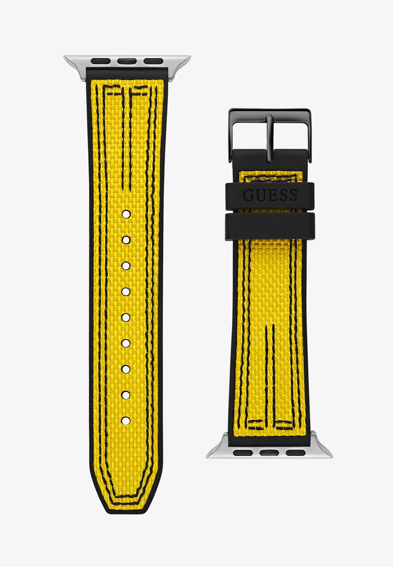 Bracelet de montre tissé jaune avec des accents noirs, présentant une finition lisse, de nombreux trous, et une boucle métallique. Nom de la marque 'GUESS' en relief.