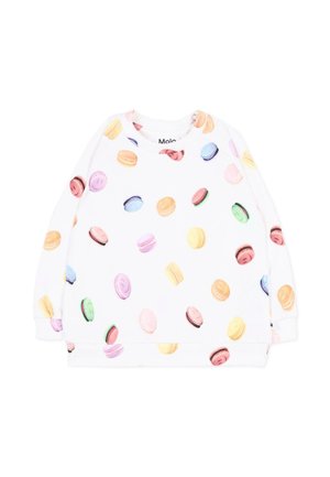 Camicia bianca a maniche lunghe con stampe colorate di macaron sparse sul tessuto, con bottoni su una spalla.