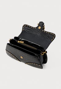 Black synthetic handbag with a crocodile texture. Features gold accents, studs along the edge, and a zippered compartment inside.