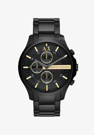 Montre en acier inoxydable noir avec un cadran noir texturé, des accents dorés, trois sous-cadrans chronographes et un bracelet en maillons.