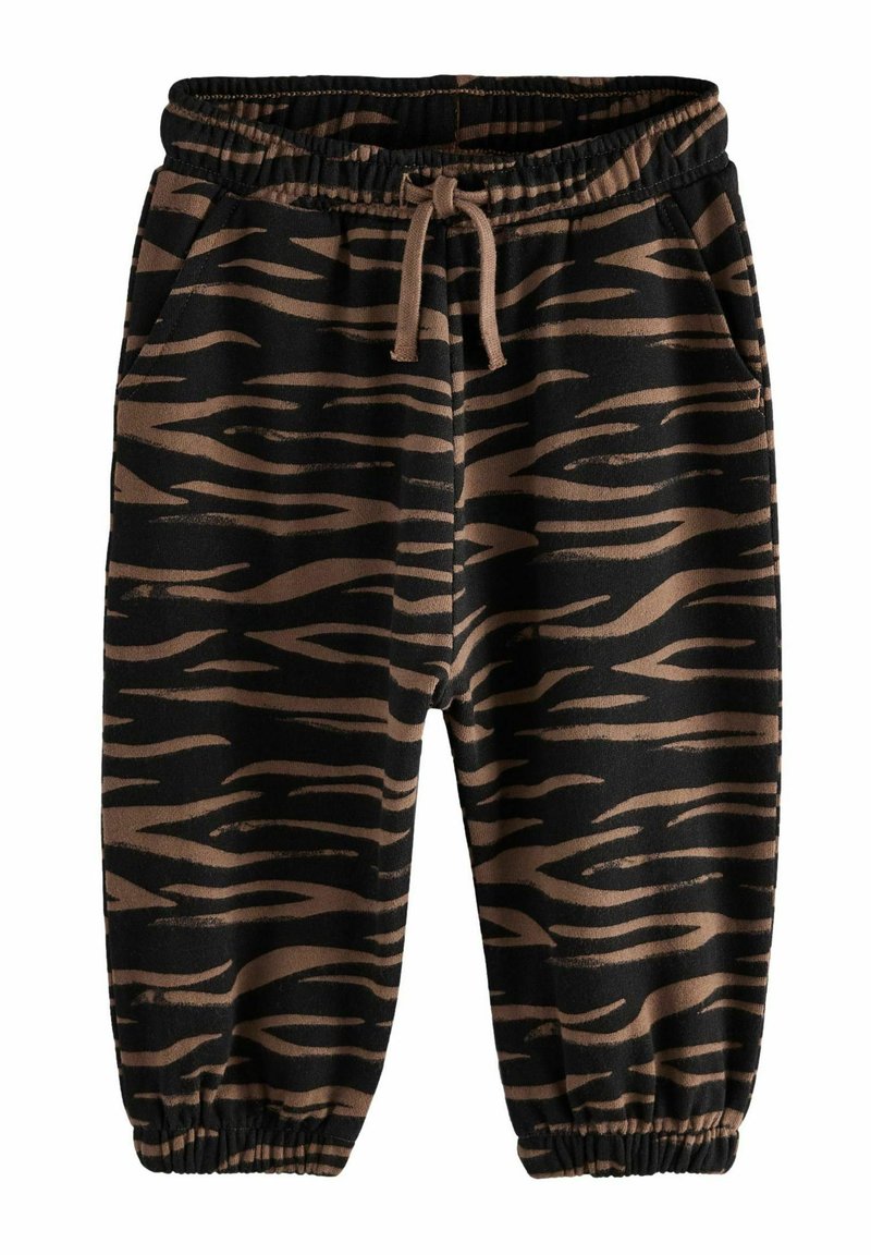 Sorte joggerbukser med et brunt tigerstribemønster, elastisk talje med snøre, og tætsiddende mansjetter ved anklerne.