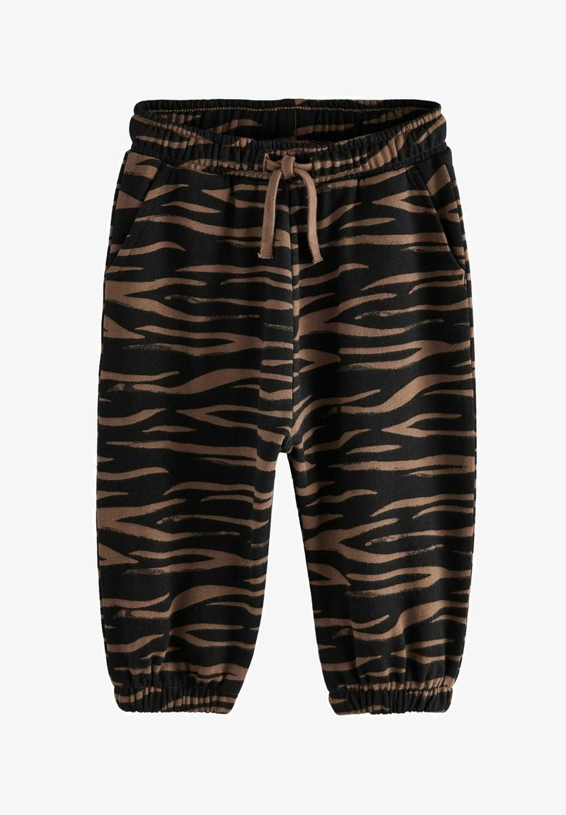Sorte joggerbukser med et brunt tigerstribemønster, elastisk talje med snøre, og tætsiddende mansjetter ved anklerne.