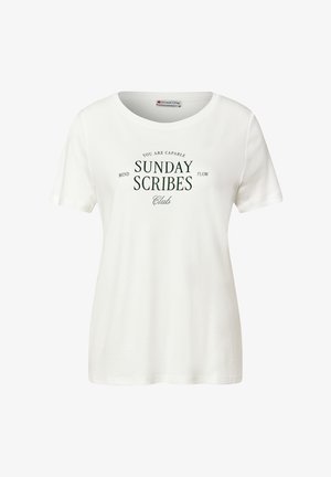 T-shirt en coton blanc avec un col rond et des manches courtes. Caractéristiques d'un texte vert : "SUNDAY SCRIBES" et d'autres phrases motivantes.
