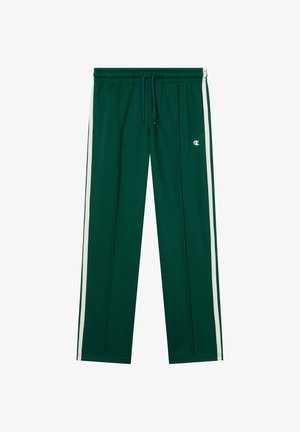 Pantaloni da jogging verde scuro con strisce laterali bianche, vita elasticizzata, coulisse e un piccolo logo Champion sulla parte superiore della coscia sinistra.