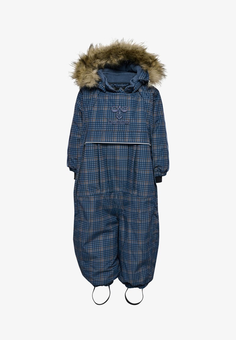 Granatowy snowboard z nadrukiem w kratę i sztucznym futerkiem przy kapturze, z zapięciem na suwak, elastycznymi mankietami i przymocowanymi paskami na stopy zapewniającymi bezpieczne dopasowanie.