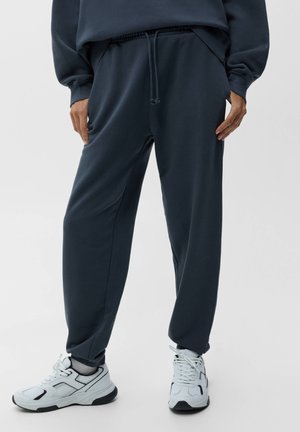 BASIC FADED - Tracksuit bottoms - grey