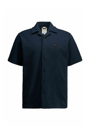 Tumesinine lühikeste varrukatega vahvlitega kudumiga särk, millel on ees nööbid ja vasakul rinnal väike must ruudukujuline logo.