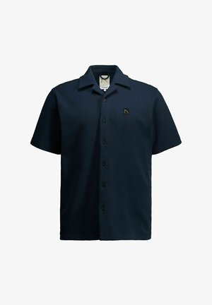 Tumesinine lühikeste varrukatega vahvlitega kudumiga särk, millel on ees nööbid ja vasakul rinnal väike must ruudukujuline logo.