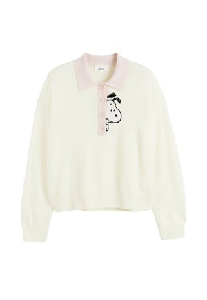 Witte trui met een lichtroze kraag en vijf knopen. Voorzien van een geborduurd Snoopy-ontwerp op de linkerbovenkant. Zachte textuur, oversized pasvorm.