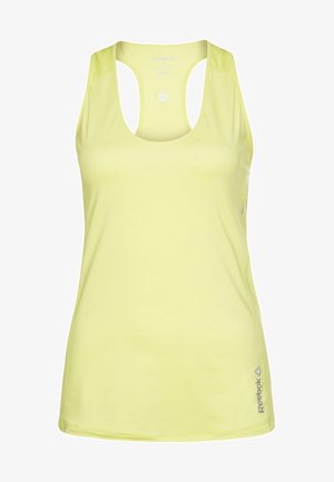 Podkoszulka Reebok w jaskrawym żółtym kolorze, z dekoltem w serek, designem z wycięciem na plecach oraz lekkim, oddychającym materiałem. Subtelny detal z logo.