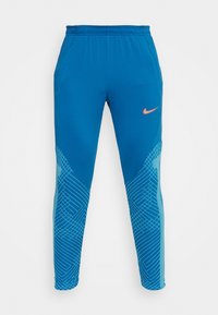 Nike sportieve broek in helderblauw met een elastische tailleband en zijzakken. De onderbenen hebben een geometrisch patroon in lichter blauw.