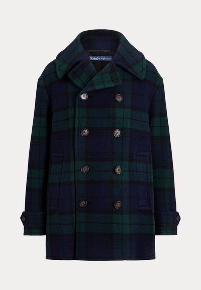 Topeltrinnaline meremehe mantel tumedsinises ja rohelises ruudulises mustris. Valmistatud villast, põhjakraega ja suurte pruunide nuppudega. Omab küljetaskuid.