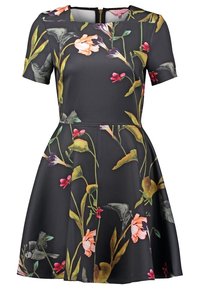 Robe noire à manches courtes et bustier ajusté. Dotée d'un motif floral avec des fleurs et des feuilles colorées, tissu texturé, fermeture éclair dans le dos.