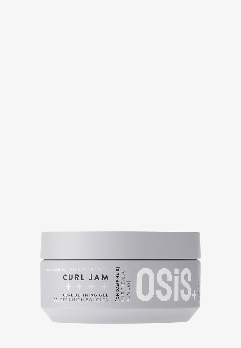 Barattolo rotondo grigio con un coperchio bianco. L'etichetta presenta un testo nero che riporta "Curl Jam Curl Defining Gel" e "OSiS+". Finitura liscia e opaca.