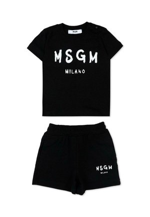 Set per bambini piccoli a maniche corte nero con testo bianco "MSGM Milano" sul davanti della maglietta e sulla gamba sinistra dei pantaloncini con vita elastica.