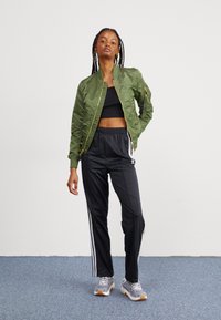 adidas Originals PANTS - Calças de fato de treino - black