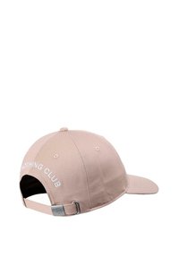 Pink baseball cap with a structured design, featuring embroidered text "NOTHING CLUB" and a metal adjuster on the back.