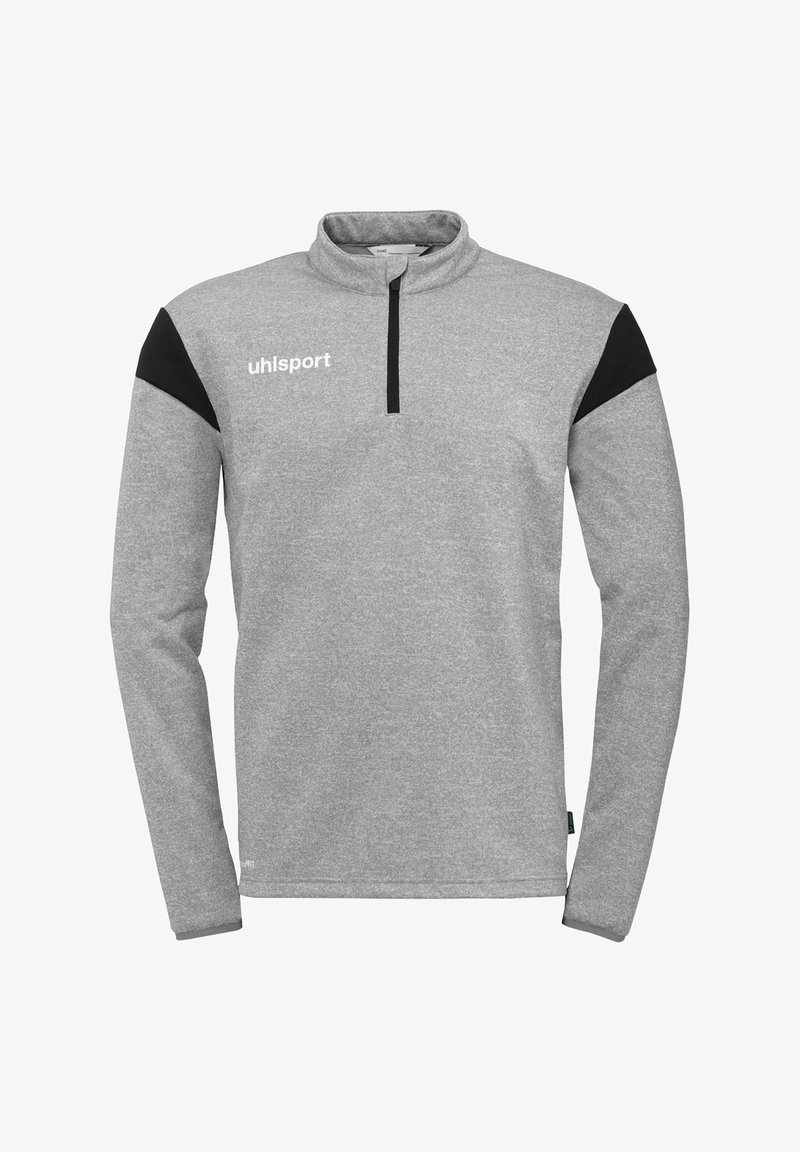 Grå fleece-pullover med halv lynlås, med sorte skulderdetaljer og et hvidt "uhlsport" logo på venstre bryst. Blød tekstur.