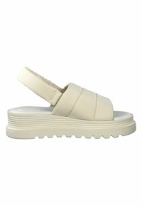 Beige slingback sandals with wide, padded straps, a smooth sole, and a ridged, textured platform for grip. Soft leather material.