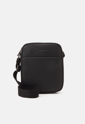 REPORTER UNISEX - Across body bag - black