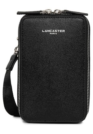 Black textured leather crossbody bag with a silver zipper, featuring a top handle, detachable shoulder strap, and embossed logo.