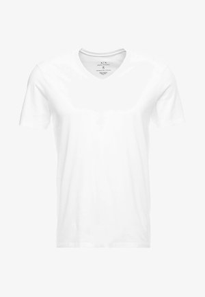 Biała koszulka z krótkim rękawem i dekoltem w serek, wykonana z bawełny. Prosty design z minimalnymi detalami szycia, idealna do codziennego noszenia. Rozmiar: M.