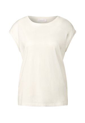 Biała bawełniana koszulka z okrągłym dekoltem, zrolowanymi krótkimi rękawami i luźnym krojem. Miękka, gładka faktura, bez wzorów i zdobień.