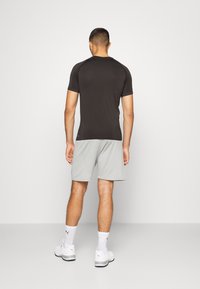 Puma TRAIN FORMKNIT SEAMLESS  - Calções desportivos - medium gray heather
