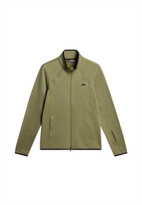 Oliwkowa kurtka zapinana na zamek z wysokim kołnierzem, kieszeniami po bokach i czarnymi akcentami. Posiada logo na klatce piersiowej i rękawie. Gładka tekstura.