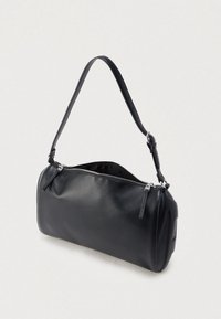 Black leather handbag with a cylindrical shape, smooth texture, detachable strap, silver zipper, and subtle embossed logo detail.