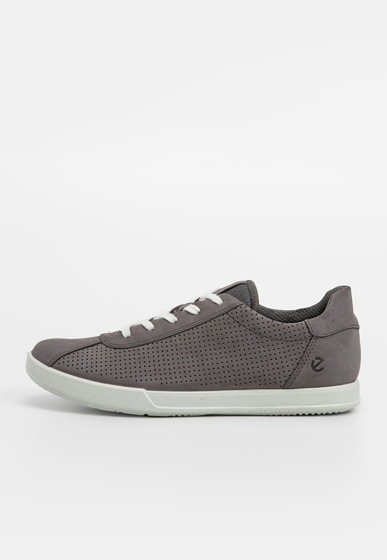 Gray sneaker made of perforated synthetic material with white laces, a light-colored rubber sole, and a subtle logo on the side.