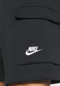 Nike Sportswear CLUB CARGO - Teplákové kalhoty - black