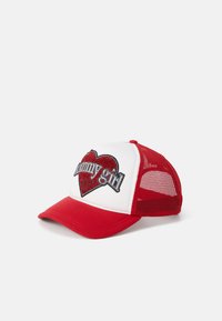 Red and white trucker cap with a heart design featuring "bunny girl" in black and red glitter, mesh back, and solid front with curved brim.
