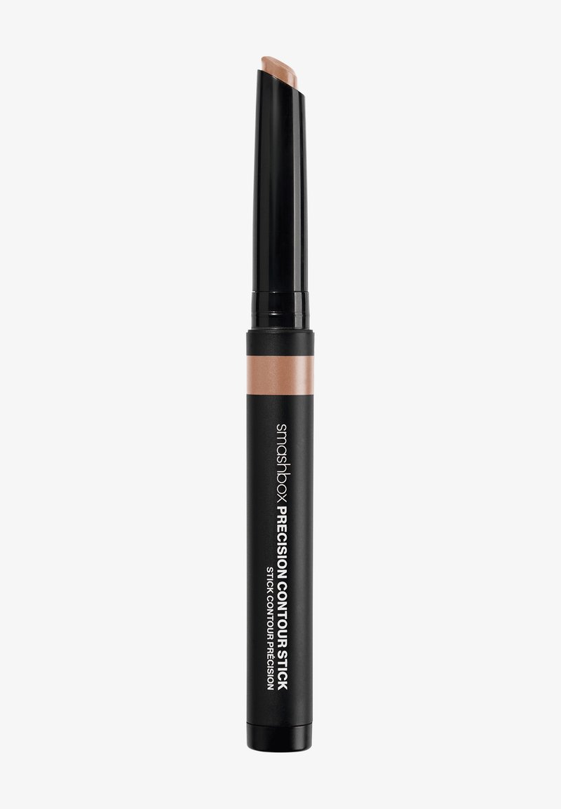 Stylo contour précis Smashbox, design cylindrique noir avec mécanisme de twist, doté d'une pointe lisse de contour beige.