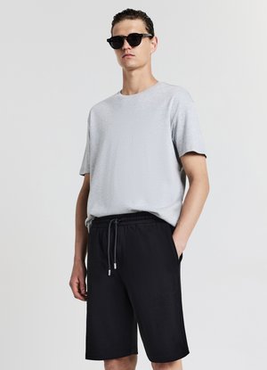 GINNICO - Pantalon de survêtement - nero ultrablack