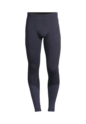 Męskie dopasowane legginsy w ciemnym granacie, charakteryzujące się gładką fakturą, elastycznym paskiem w talii oraz kontrastującą tonową wstawką w okolicy łydki.