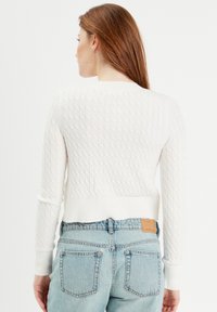 Cache Cache MIT LANGEN ÄRMELN ZOPFMUSTER - Strickjacke - ecru