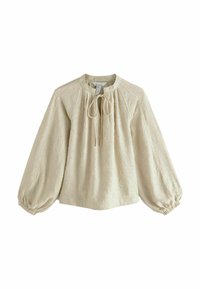 Hellbeige Bluse mit strukturiertem Blumendesign, rundem Halsausschnitt und Kordelzug. Hat lange, puffige Ärmel mit elastischen Bündchen.