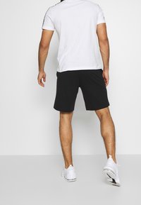 Champion Träningsshorts - black