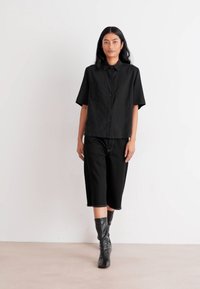 Mads Nørgaard ROBYN - Short en jean - black