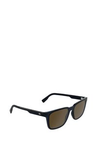 Occhiali da sole quadrati blu navy con lenti colorate marroni. Presentano una finitura opaca elegante e accenti argento sulle aste. Montatura in plastica resistente.